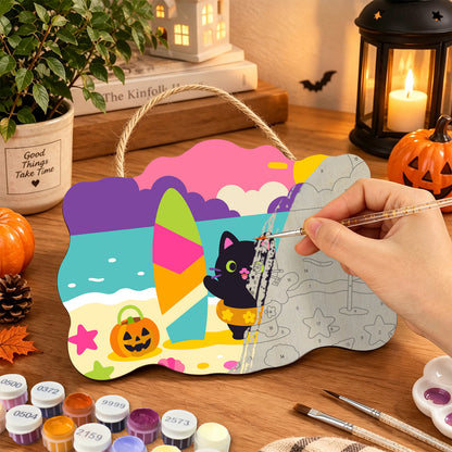 Pancarte Chat Noir en Bouée en cours de peinture, pinceau à la main — Maison Artsen