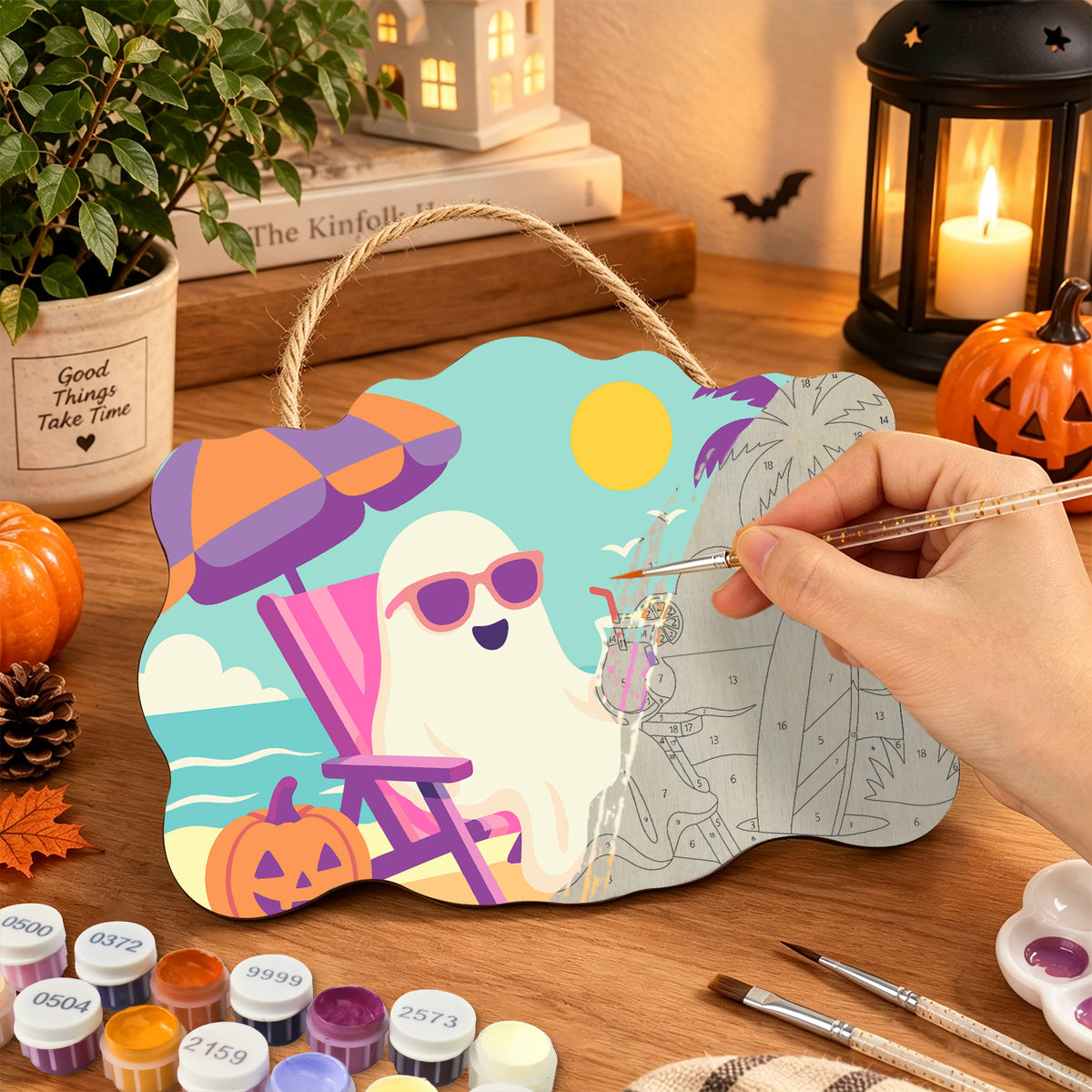 Pancarte Fantôme en Vacances en cours de peinture, pinceau à la main — Maison Artsen