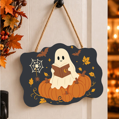 Pancarte Fantôme Lecteur sur Citrouilles peinte et accrochée à une porte d'entrée décorée pour Halloween — Maison Artsen