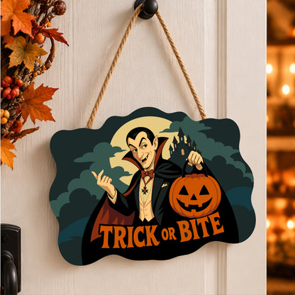 Pancarte Vampire au Seau Citrouille peinte et accrochée à une porte d'entrée décorée pour Halloween — Maison Artsen